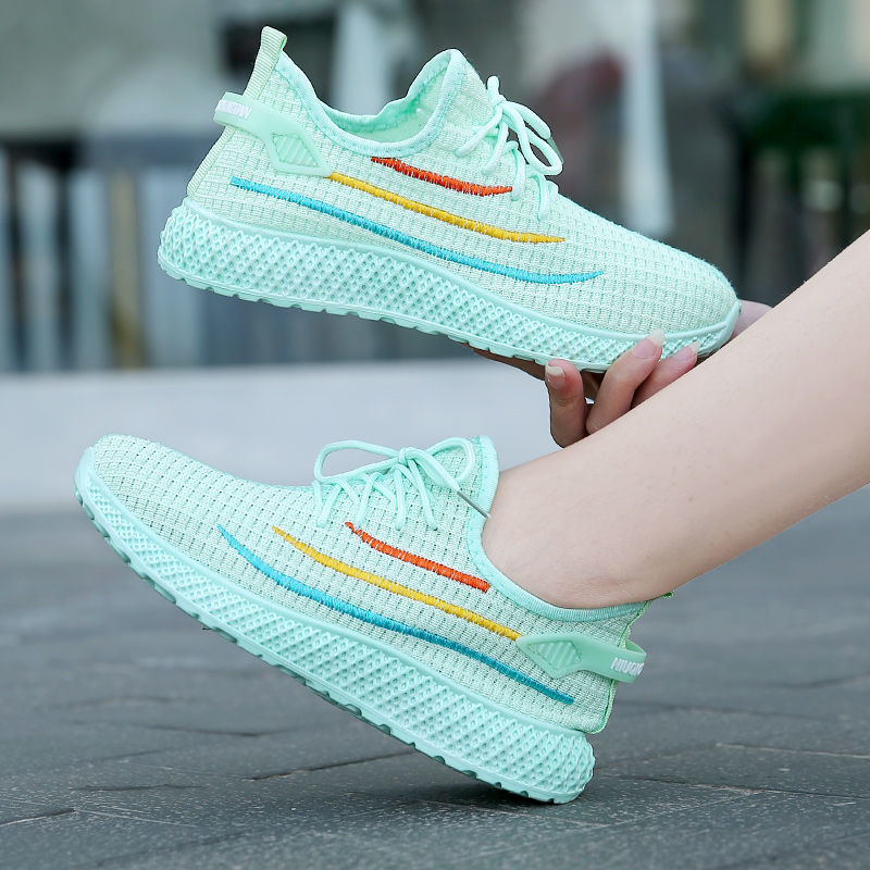 Wholesale of foreign trade Women's shoes in spring and summer Women's casual sports shoes Floor stall Fashion stripe flying woven shoes New Korean version tennis shoes